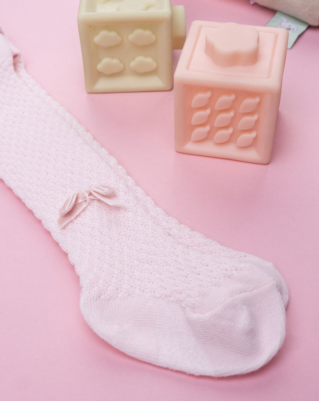 Collant neonata rosa con fiocchetto