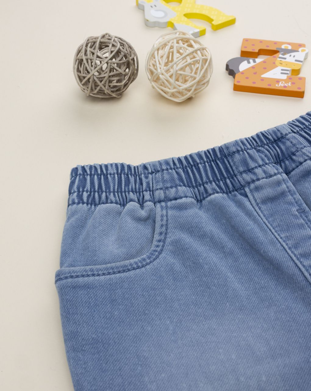 Pantalone denim bimba rouches