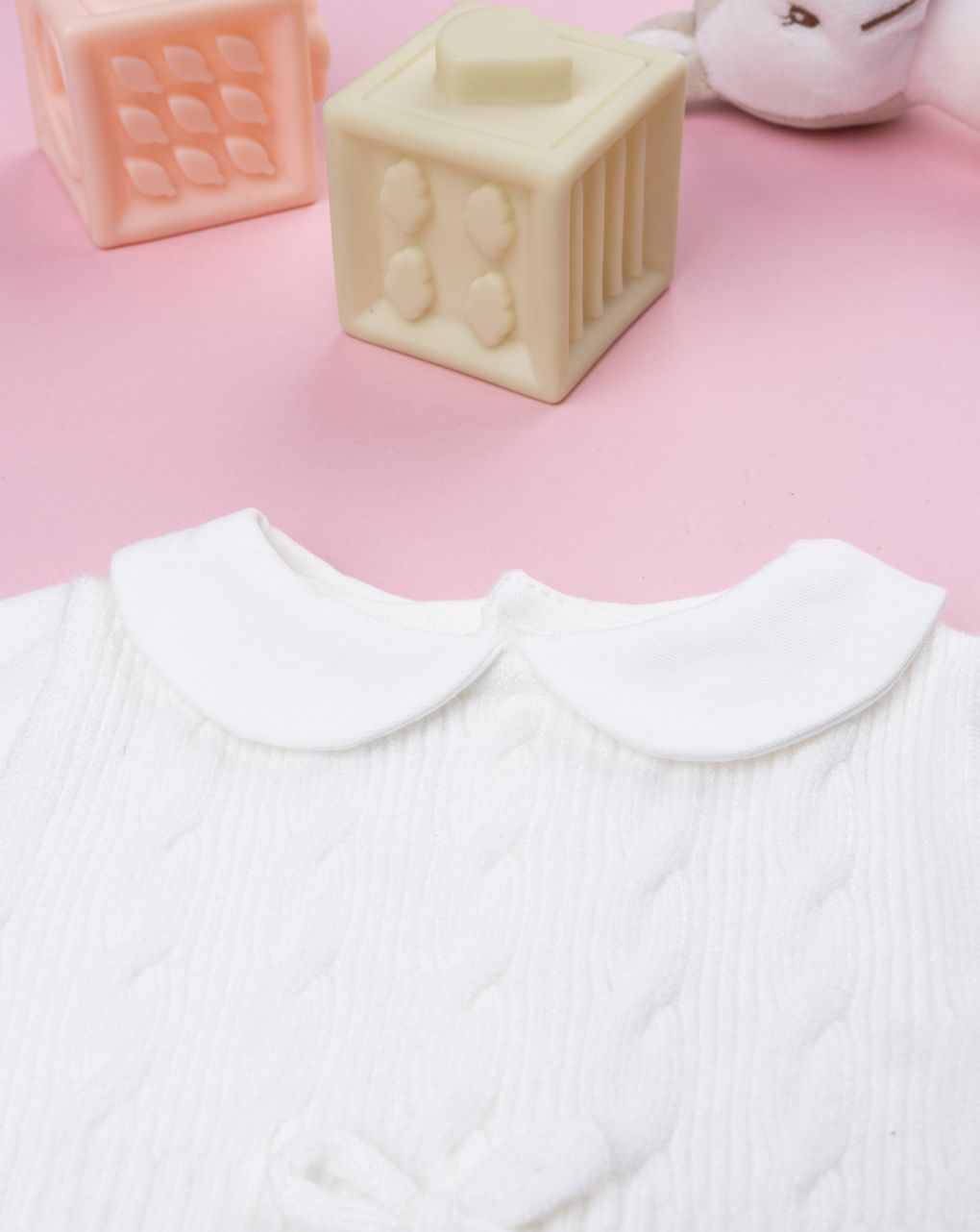 Tutina neonata tricot bianco con fiocco