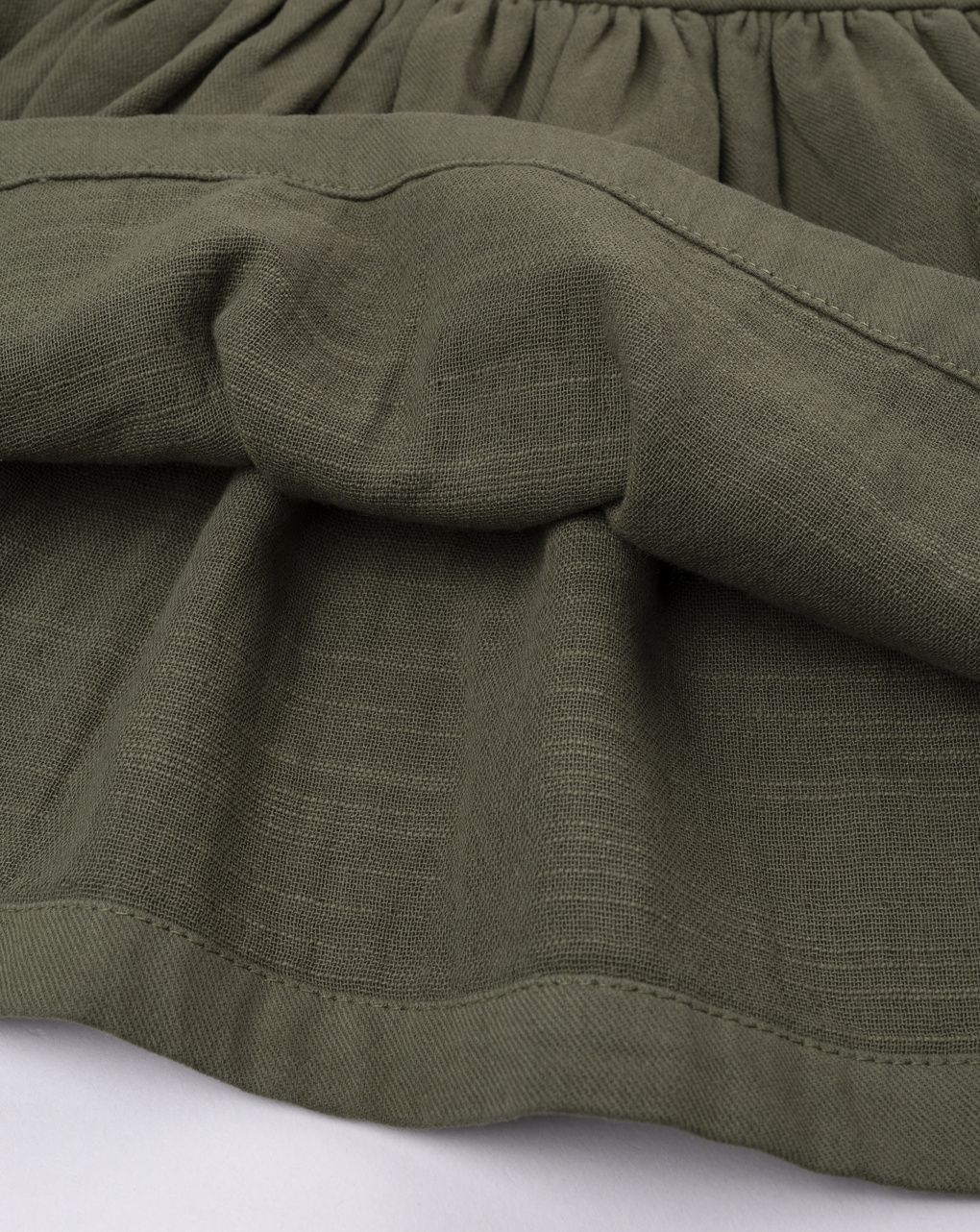 Abito salopette bimba verde con ricami