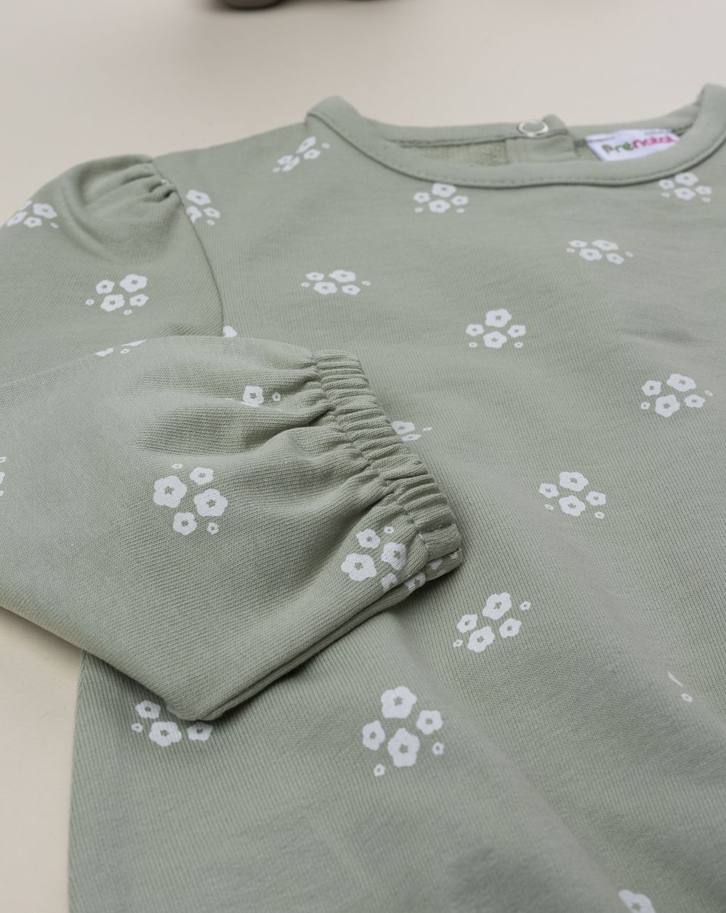 Felpa bimba verde stampa fiori bianchi