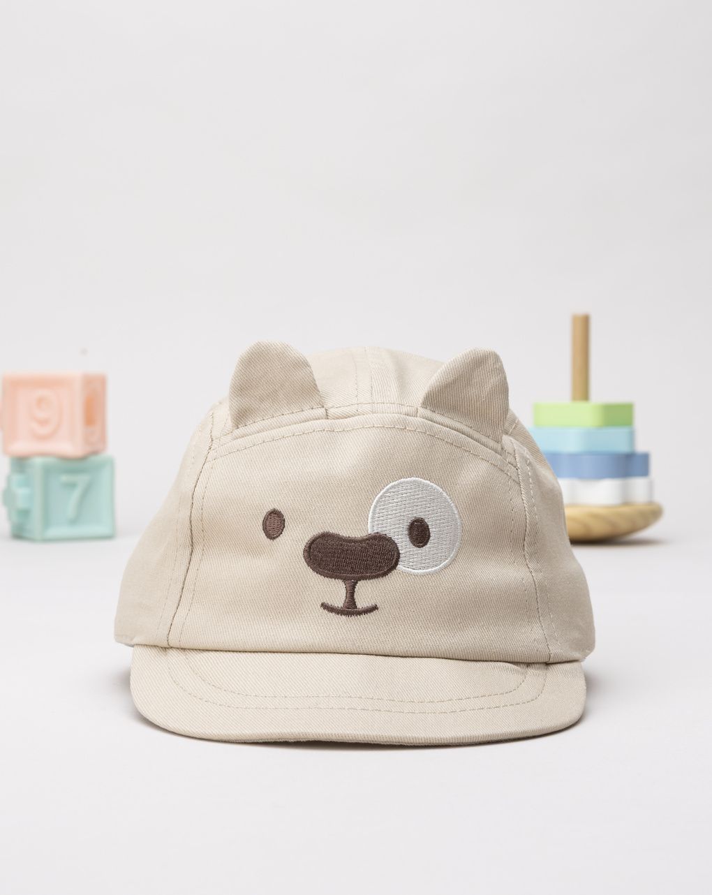Cappello con visiera bimbo beige animato