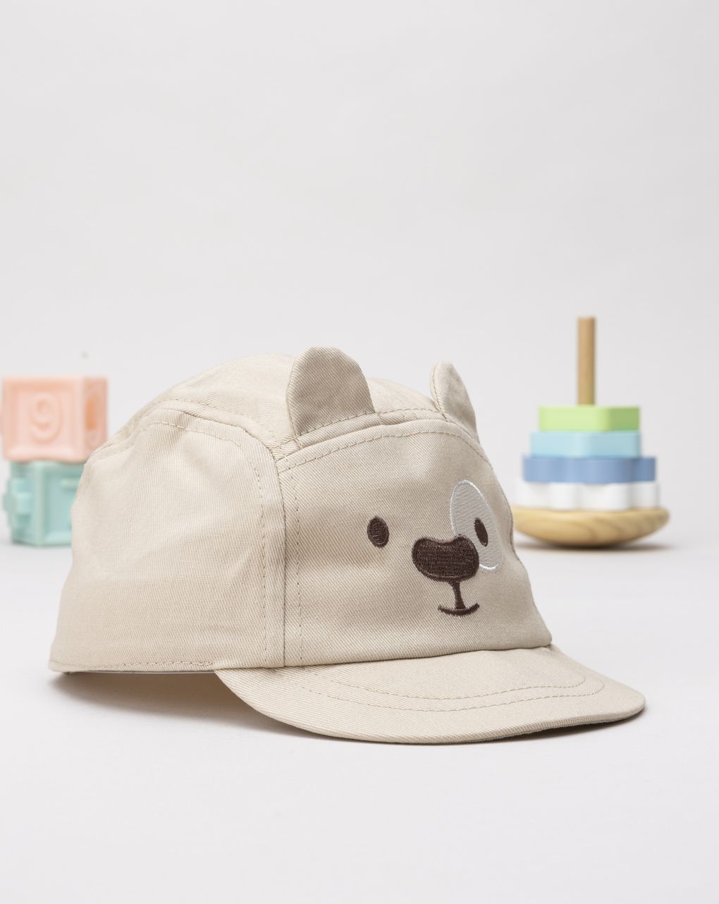Cappello con visiera bimbo beige animato