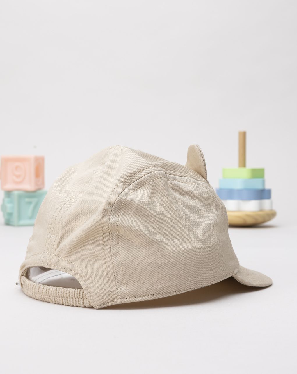 Cappello con visiera bimbo beige animato