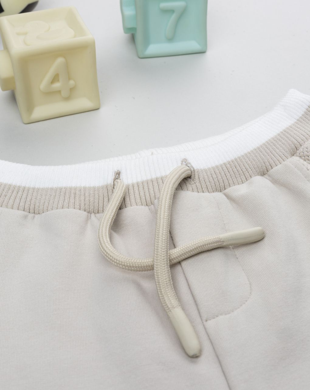 Pantalone bimbo beige tasche