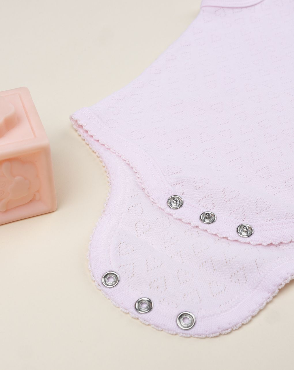 Body bimba rosa spalla larga traforato