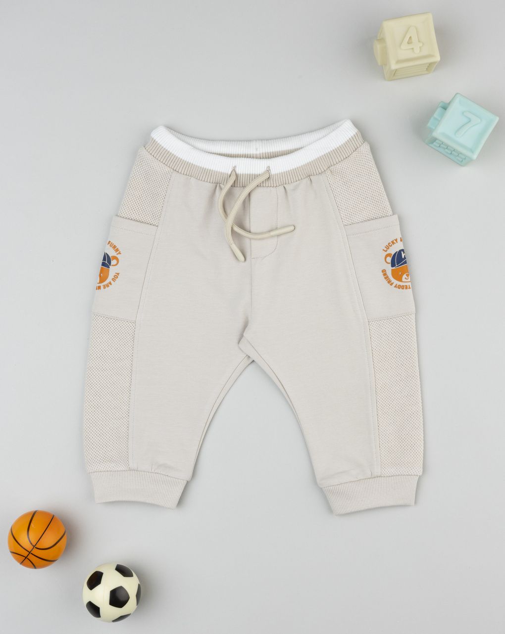 Pantalone bimbo beige tasche