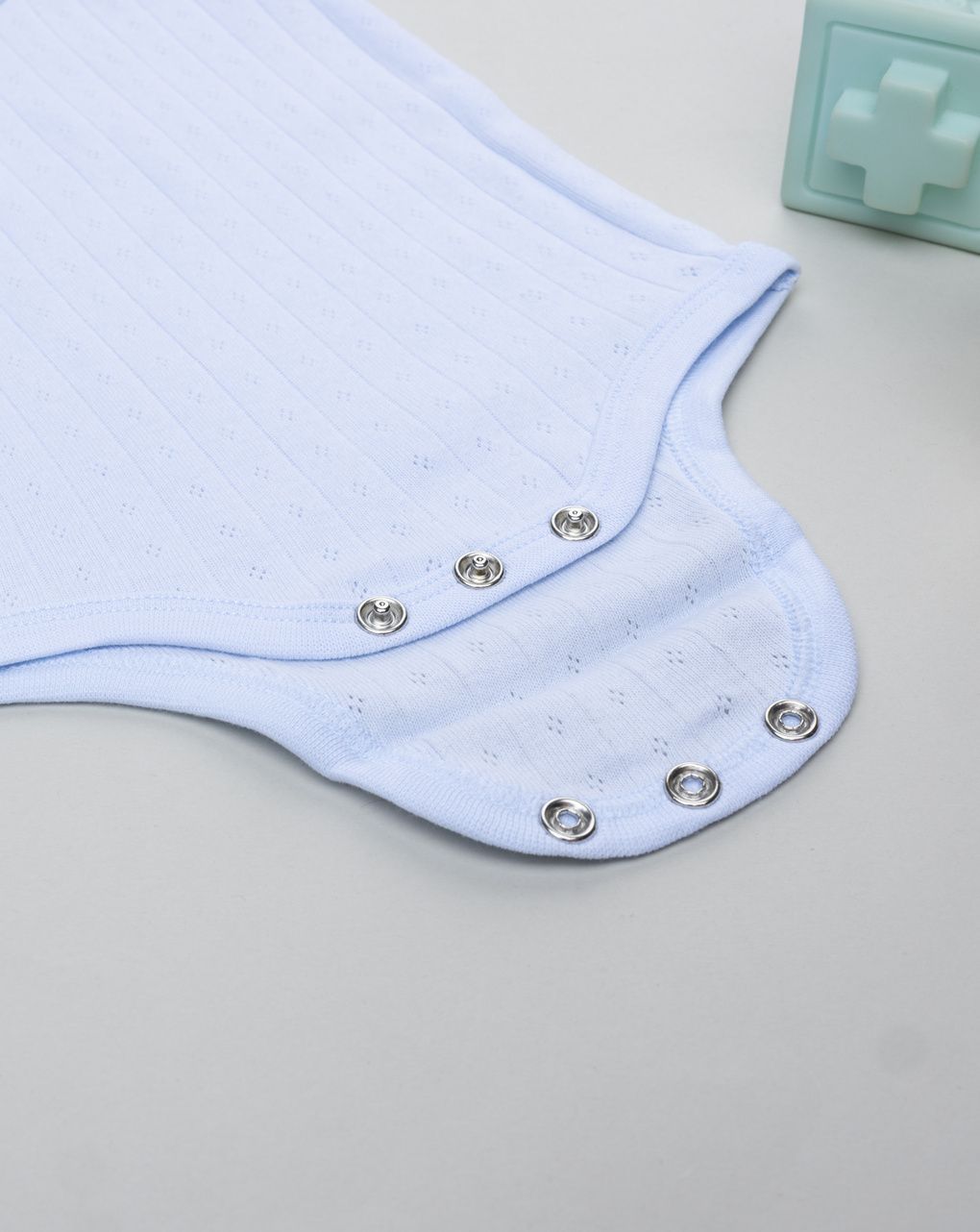 Body bimbo azzurro coste traforato