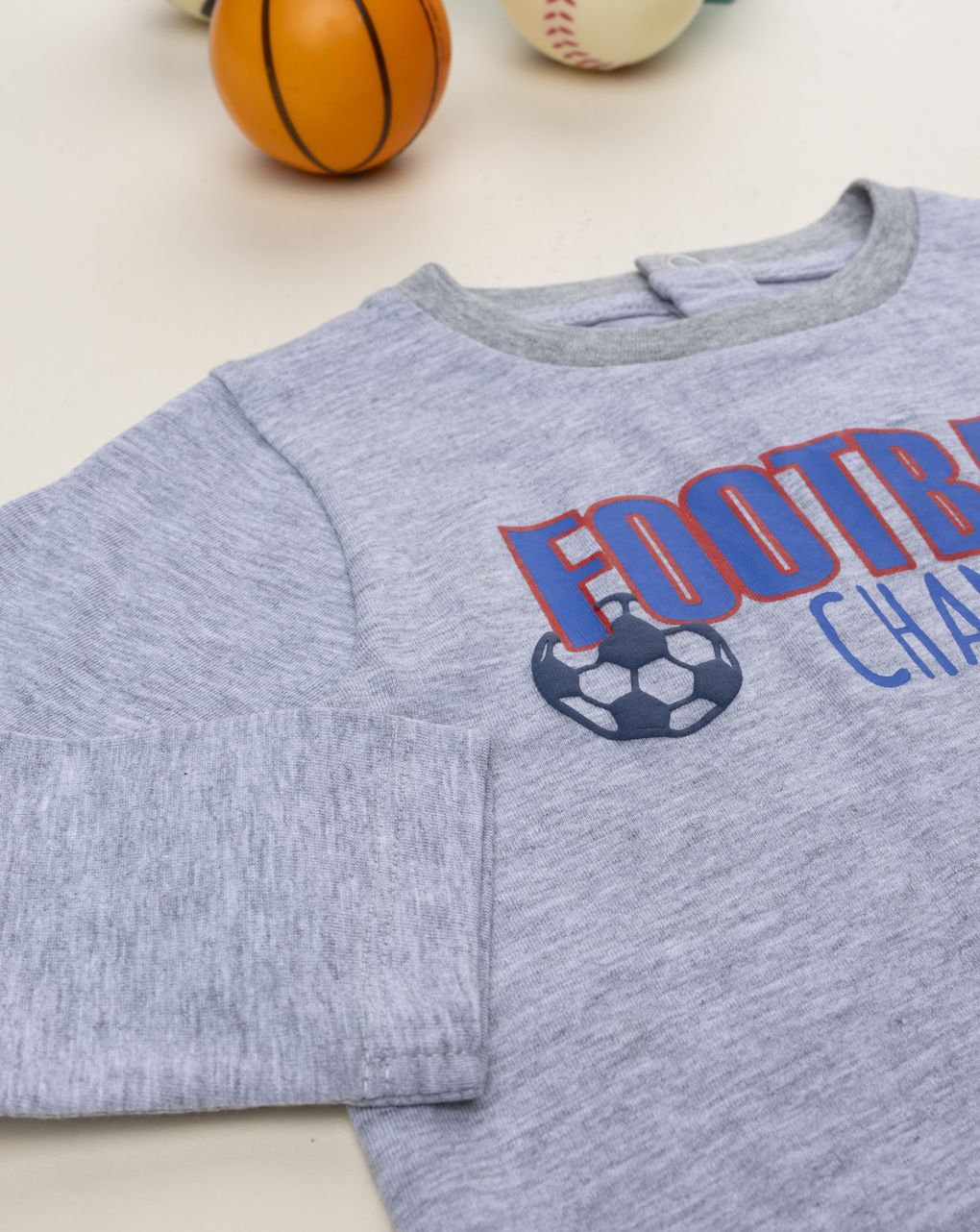 T-shirt bimbo grigia stampa football