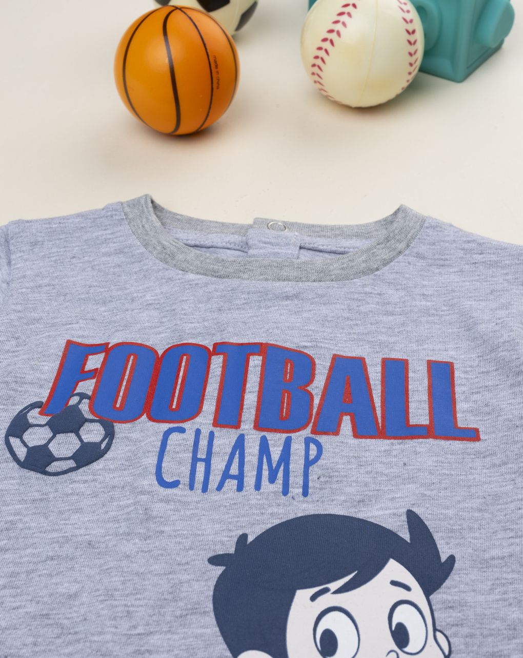 T-shirt bimbo grigia stampa football