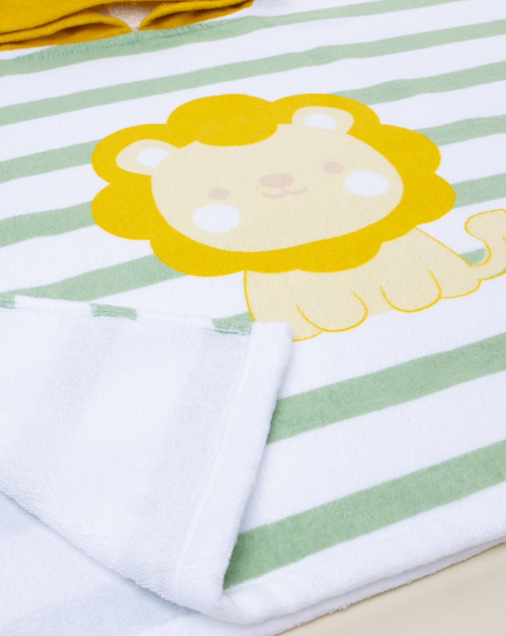 Poncho mare bimbo bianco/verde leone