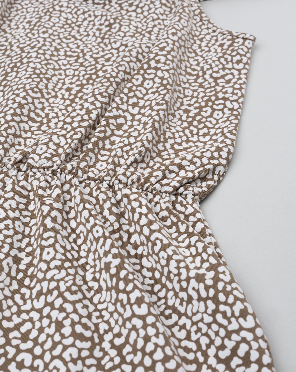 Tutina bambina macula marrone