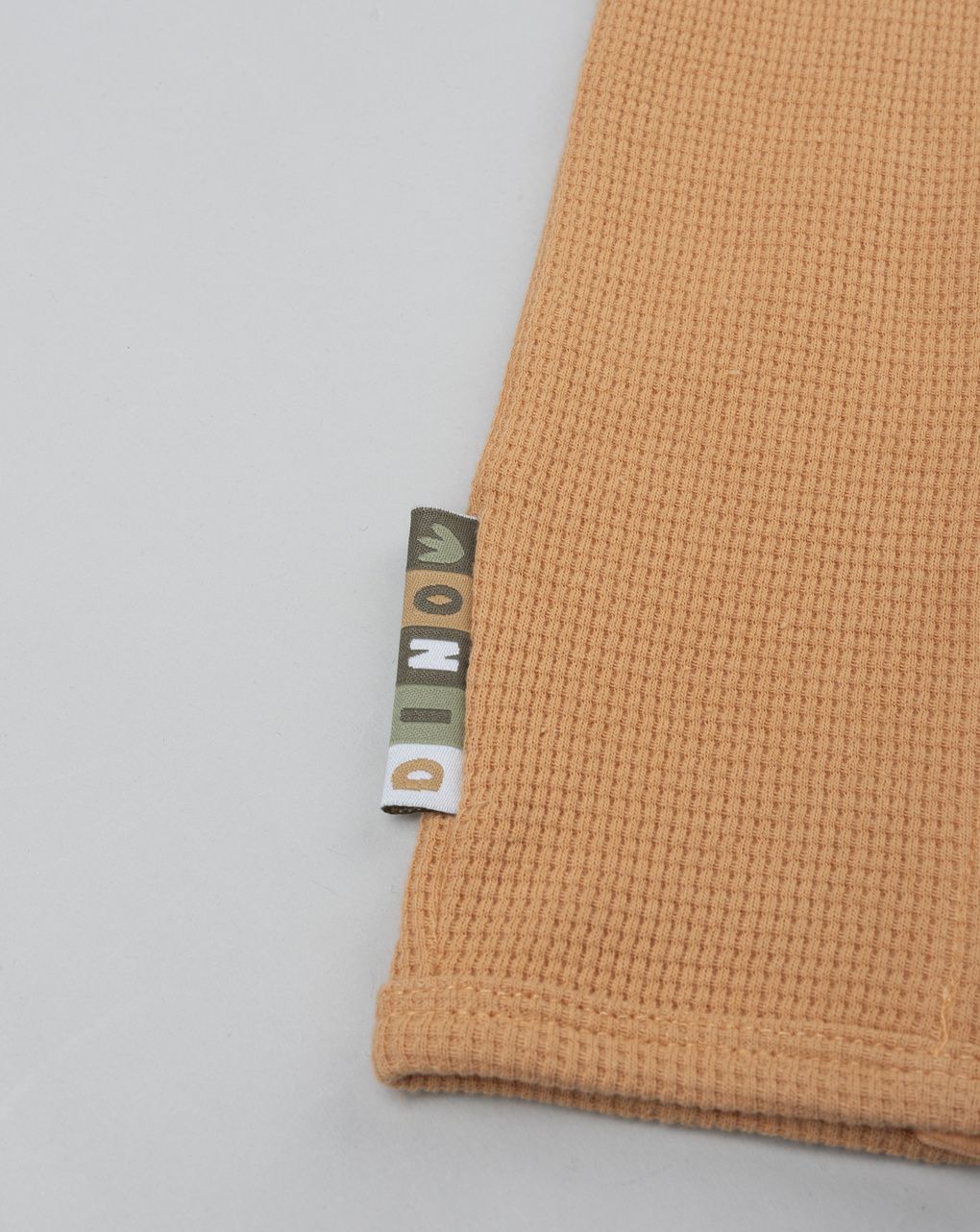 Tutina neonato arancione dinosauri