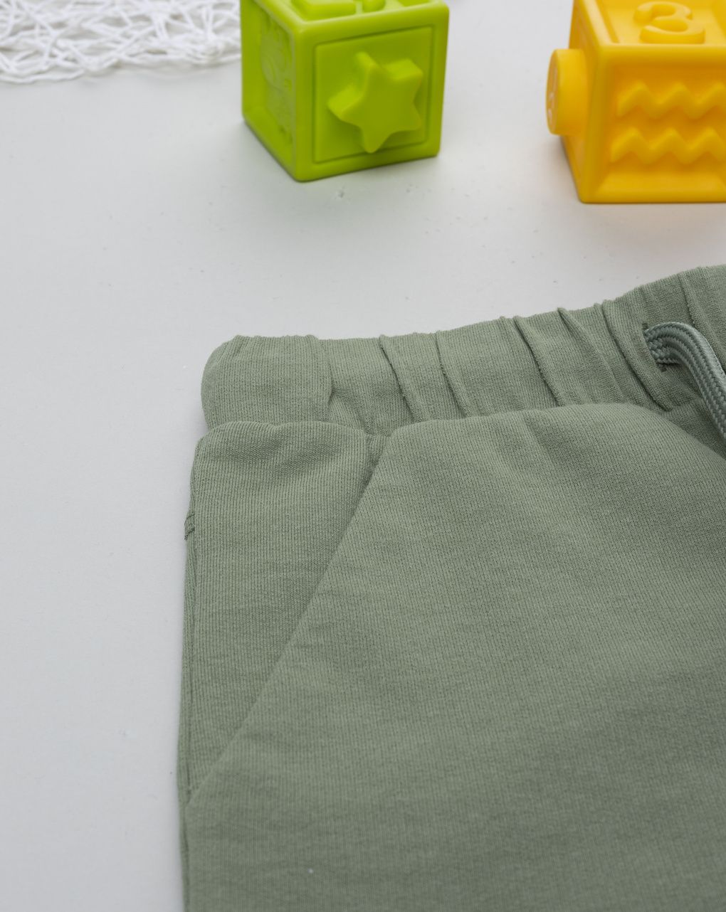 Short bambino verdi con tasche