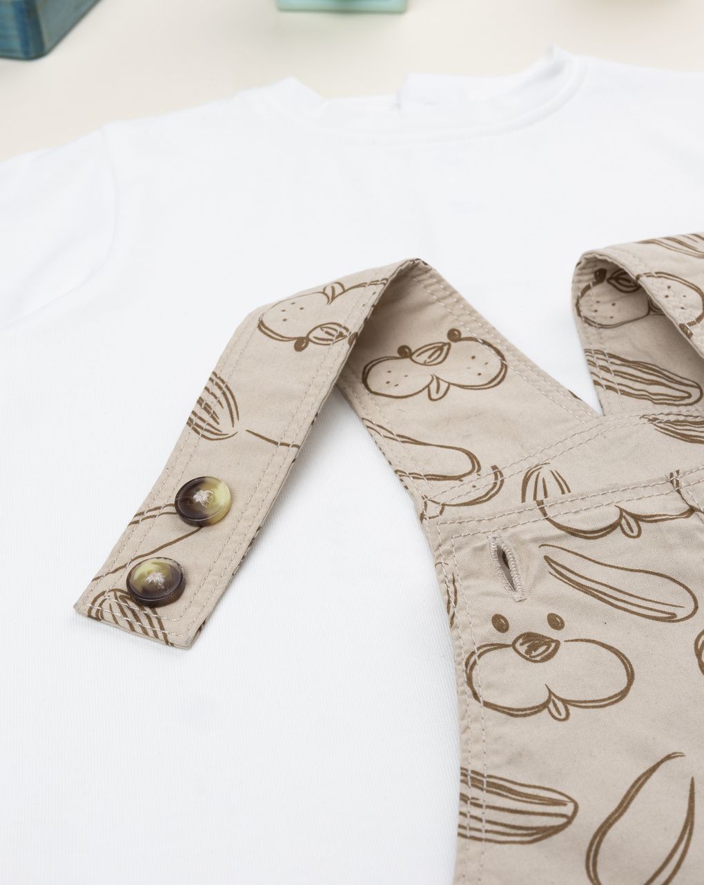 Completo salopette bimbo beige