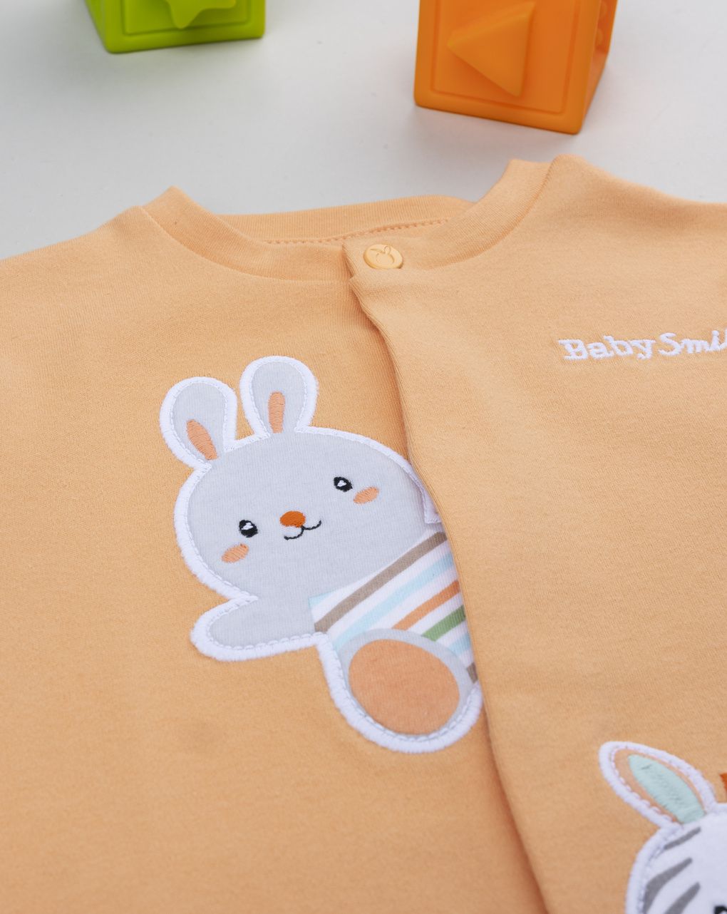 Tutina bimbo arancione organic cotton