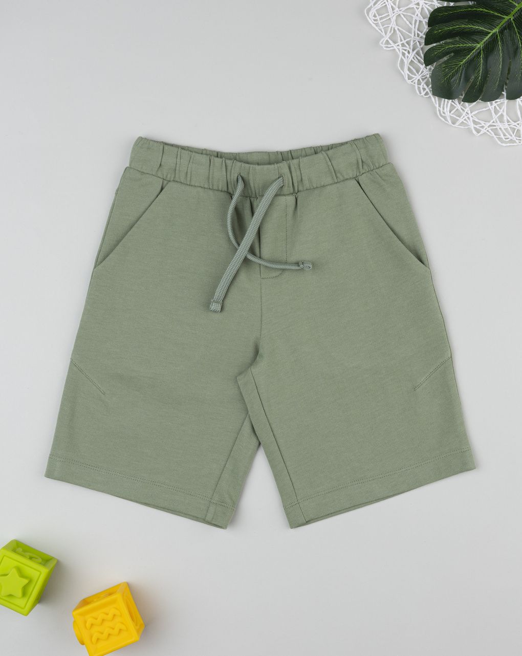 Short bambino verdi con tasche