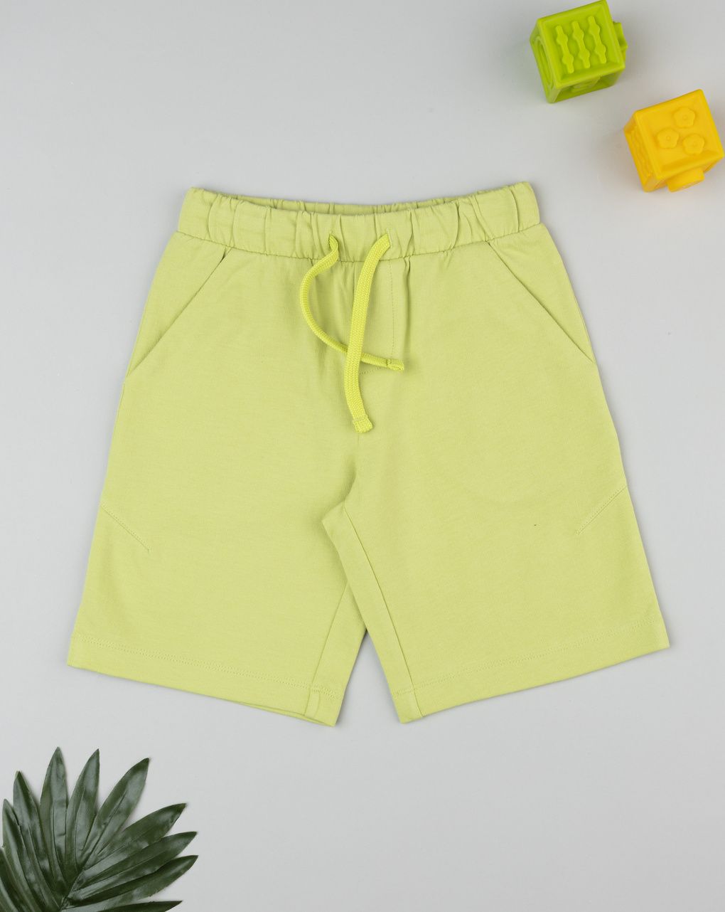 Shorts bambino verde fluo con tasche