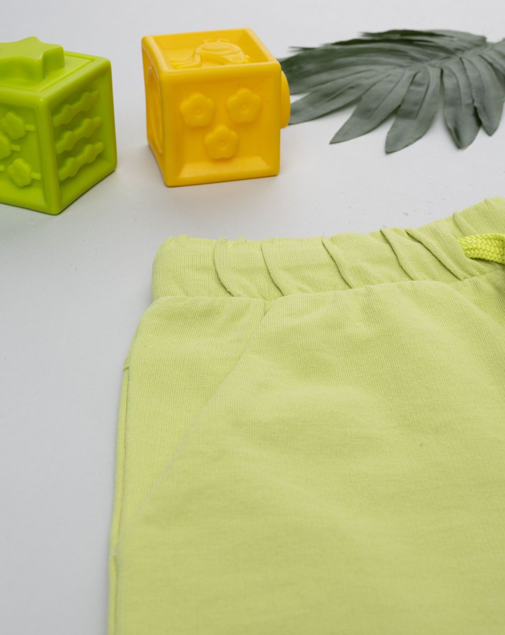 Shorts bambino verde fluo con tasche