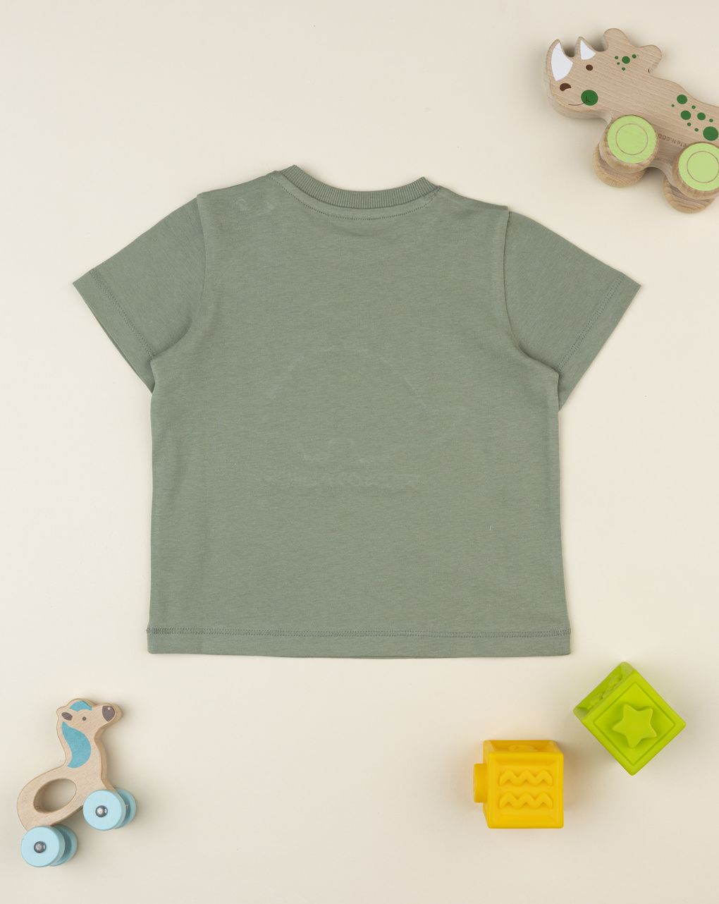 T-shirt bimbo verde stegosauro