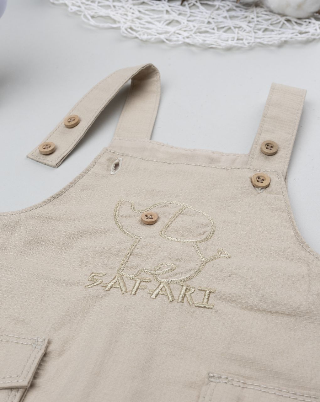 Salopette bimbo beige con tasche