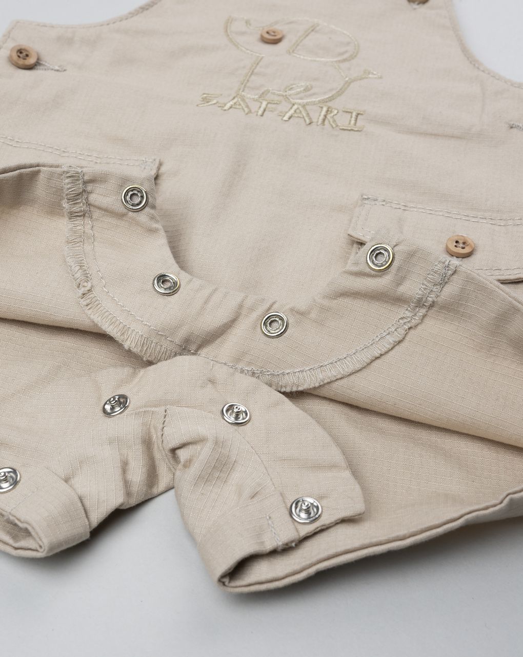 Salopette bimbo beige con tasche