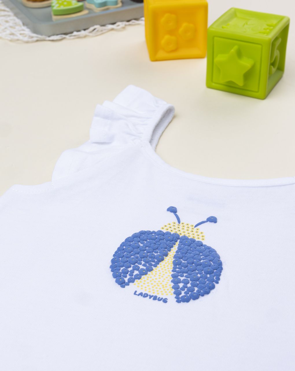 Canotta bimba bianca coccinella strass