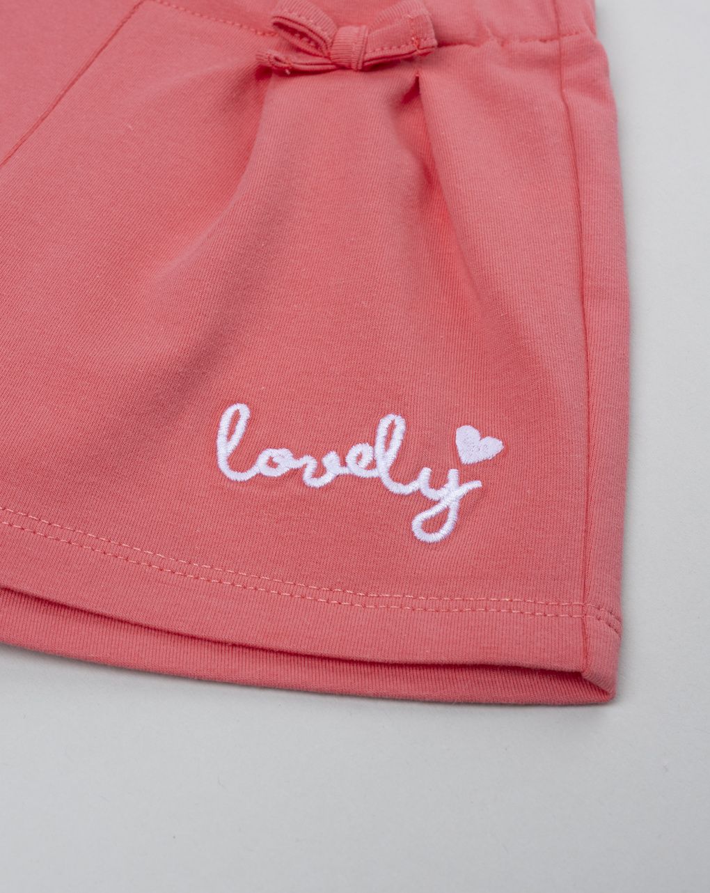 Shorts bimba corallo scritta