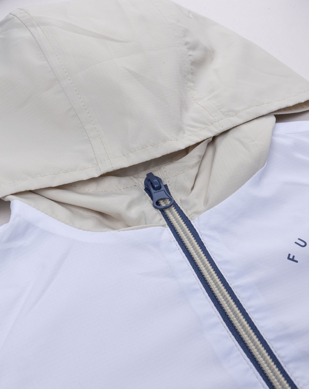 Antivento bimbo bianco/beige