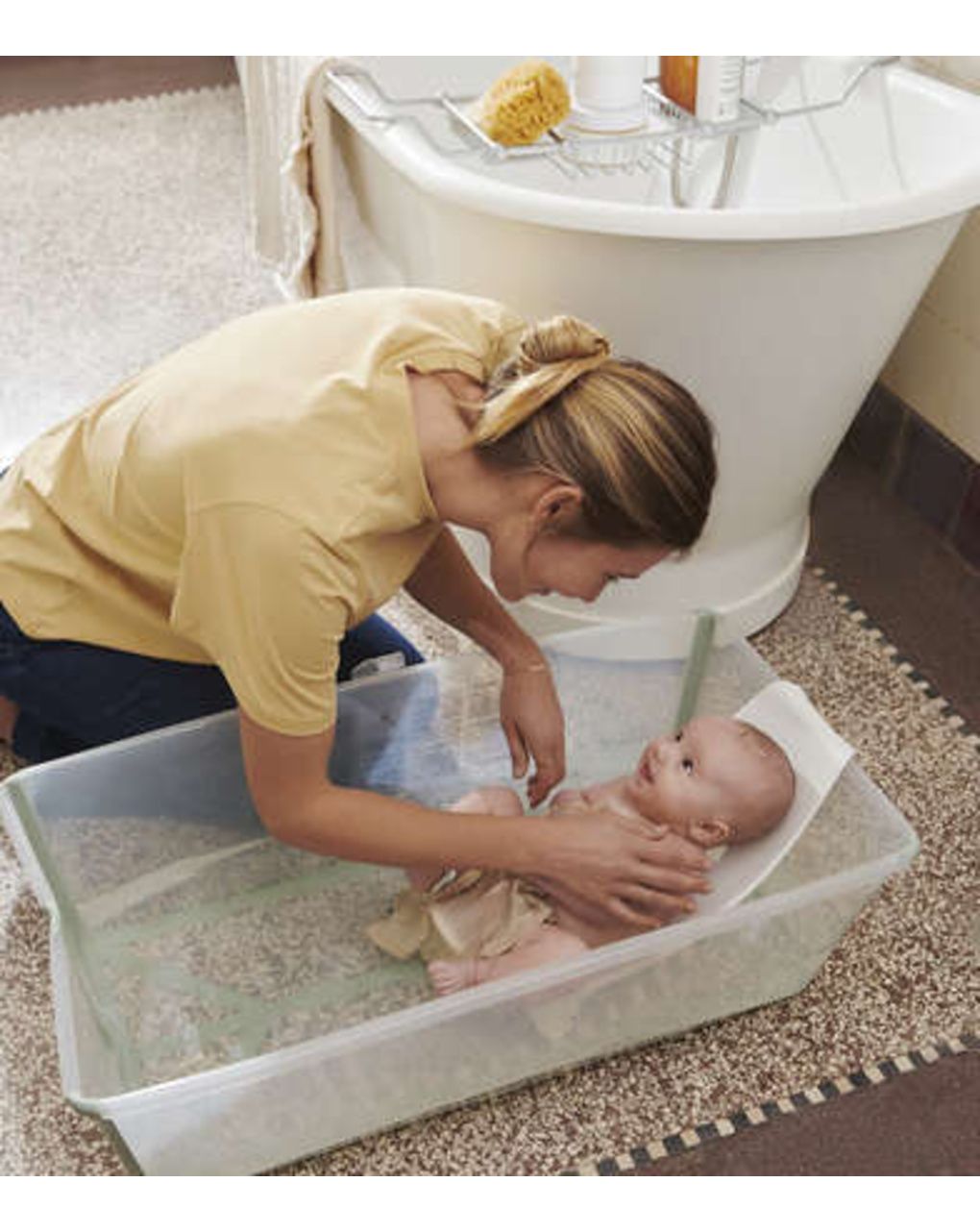 Vaschetta pieghevole flexi bath® con supporto per neonati - transparent green - stokke®