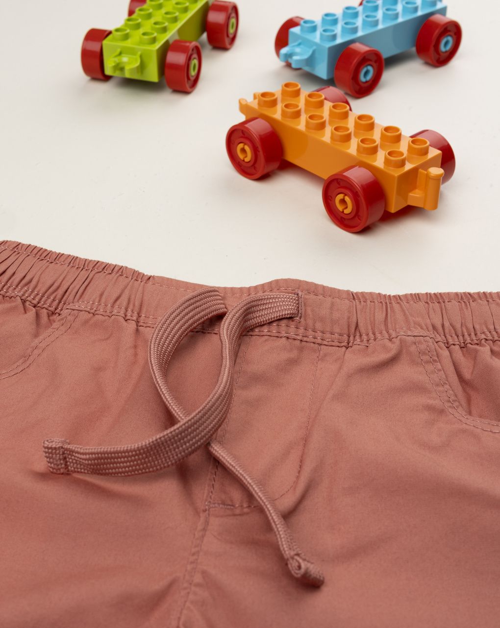 Shorts bimbo arancione