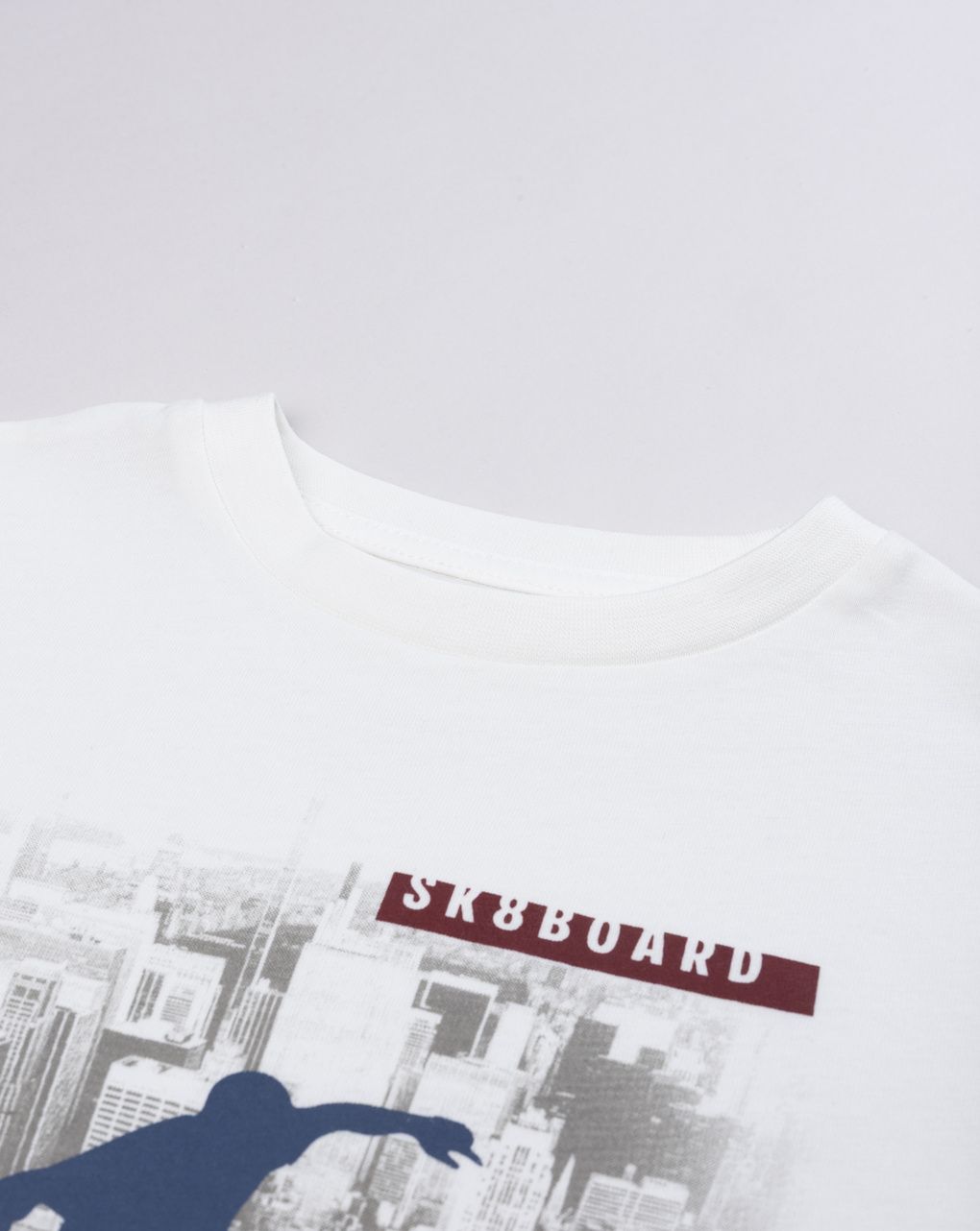 T-shirt bambino bianca manica lunga con stampa skate