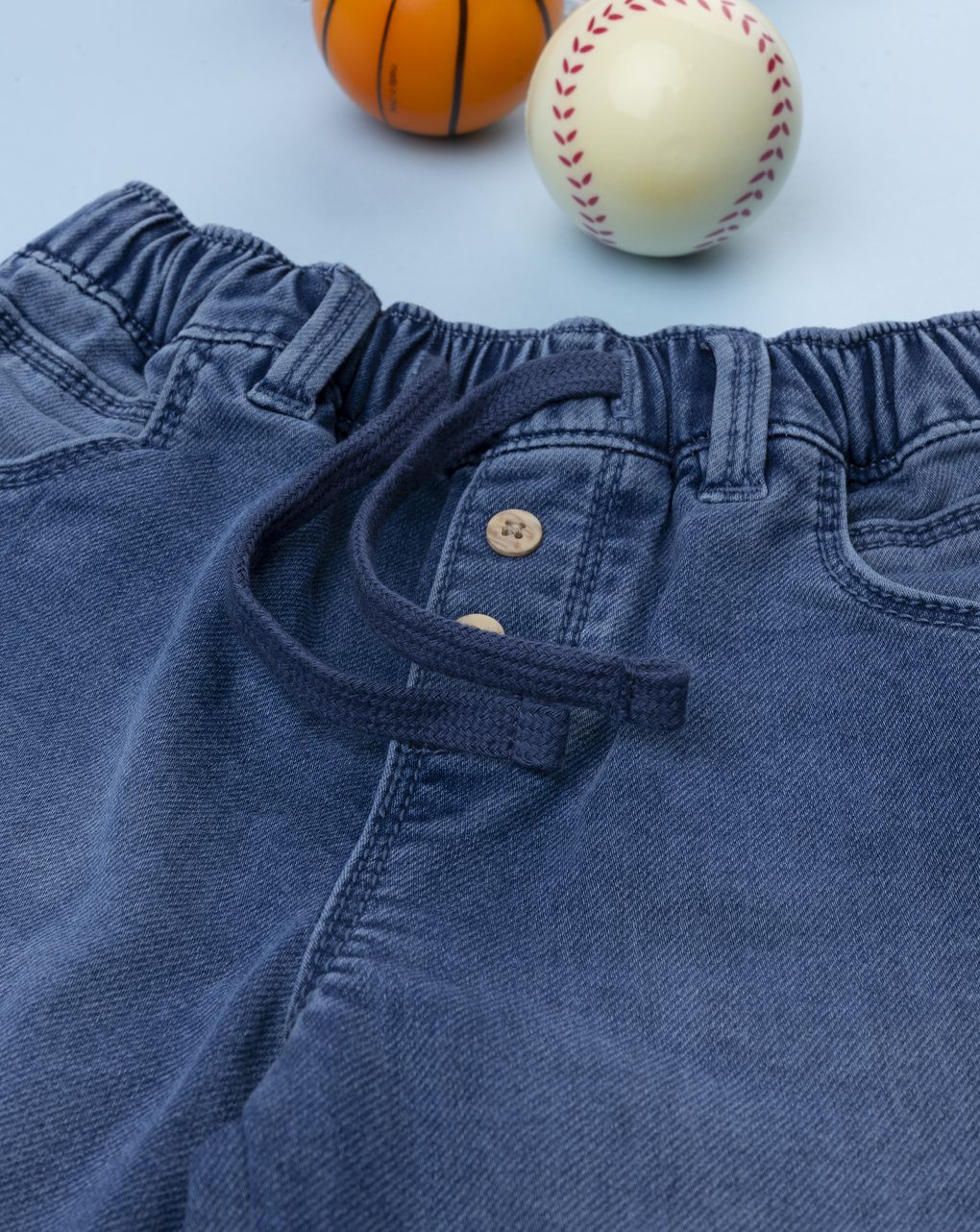 Pantalone denim bimbo con risvoltino e vita elasticizzata