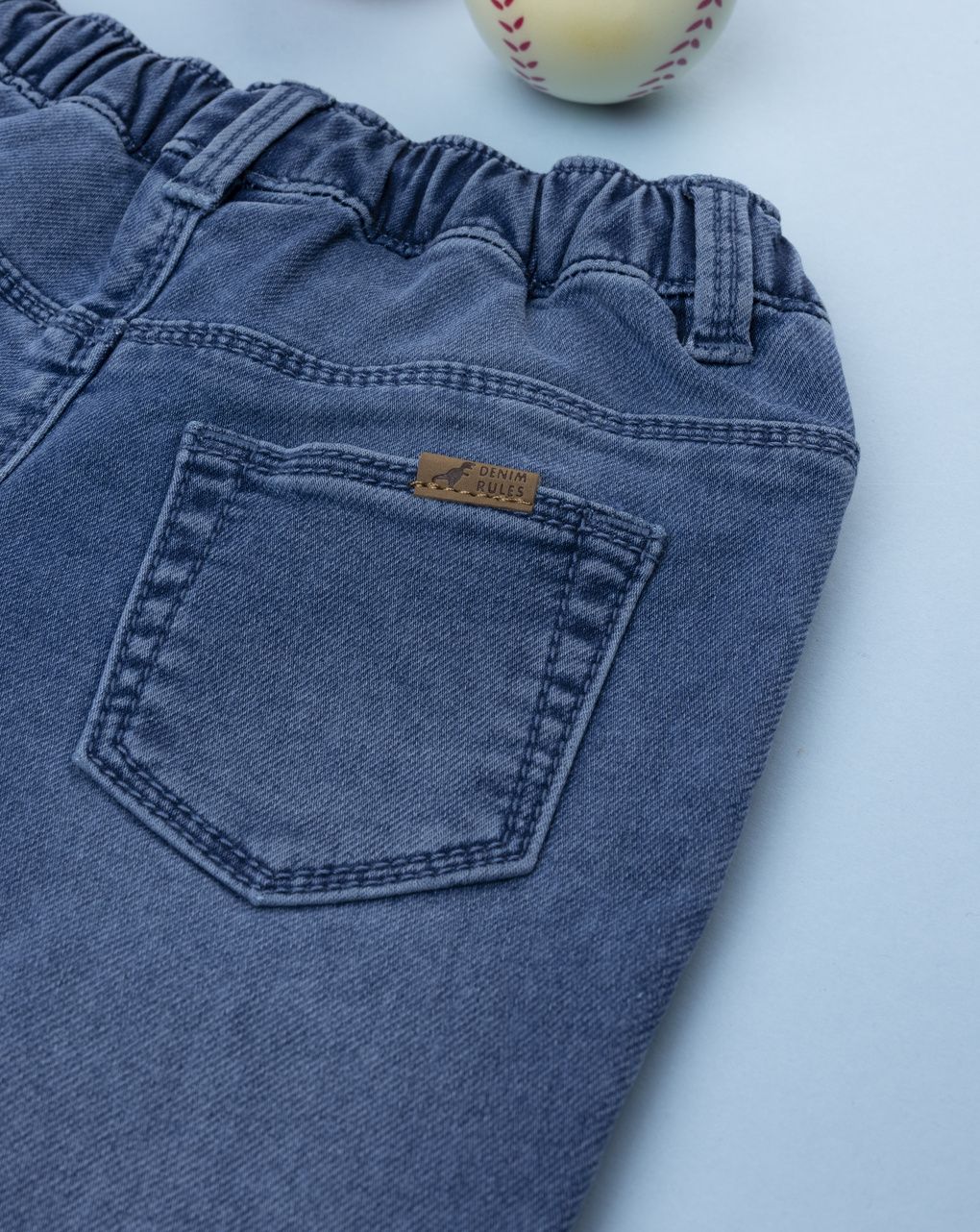 Pantalone denim bimbo con risvoltino e vita elasticizzata
