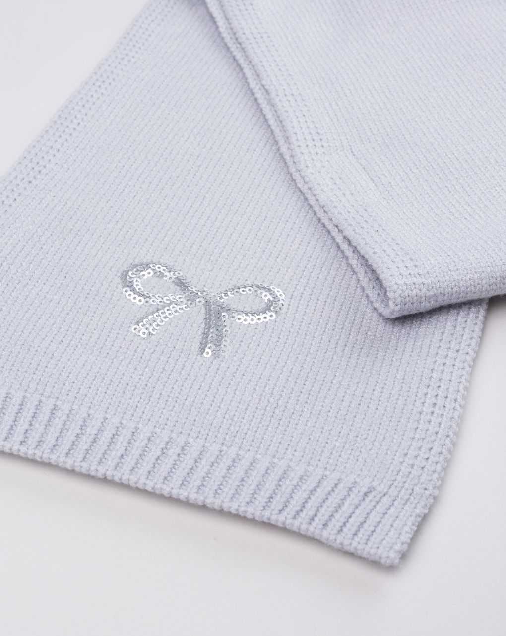 Sciarpa bambina tricot grigia con fiocchetto