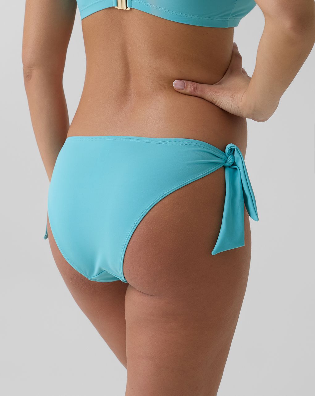 Slip bikini premaman azzurro con laccetti