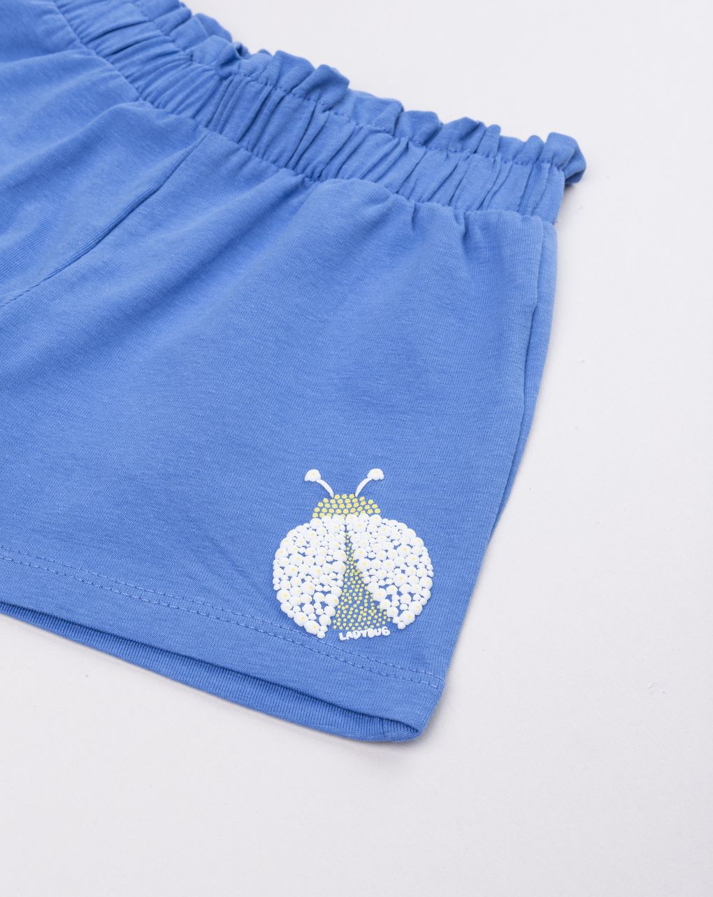 Shorts bimba blu stampa coccinella