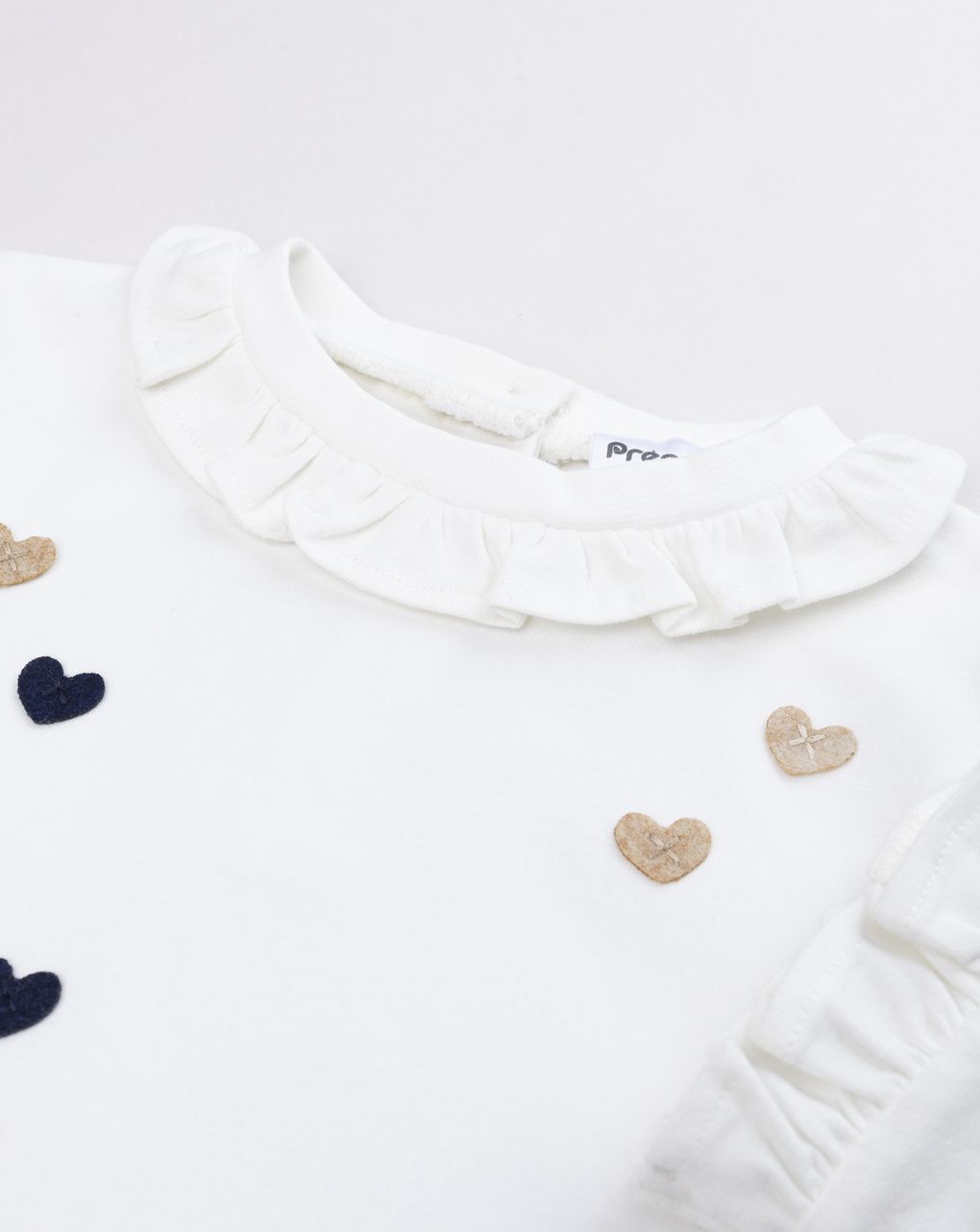 T-shirt manica lunga bianca bimba con cuoricini e volant