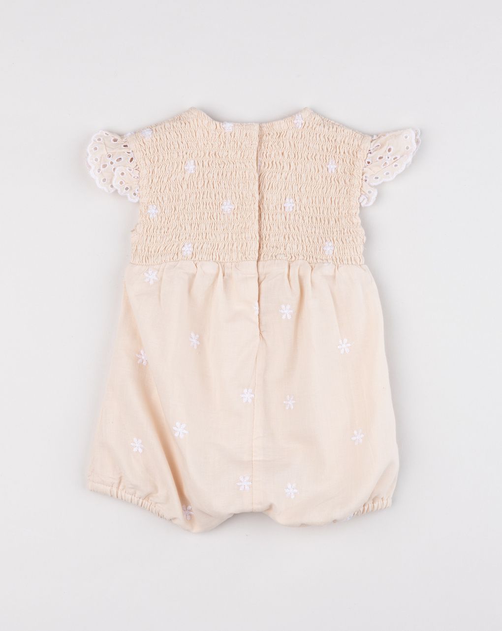 Pagliaccetto pesca per neonata con ricami e sangallo