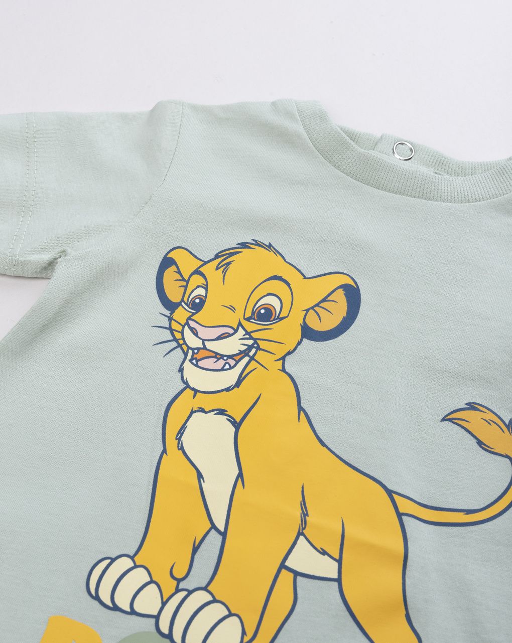 Pagliaccetto neonato verde stampa re leone