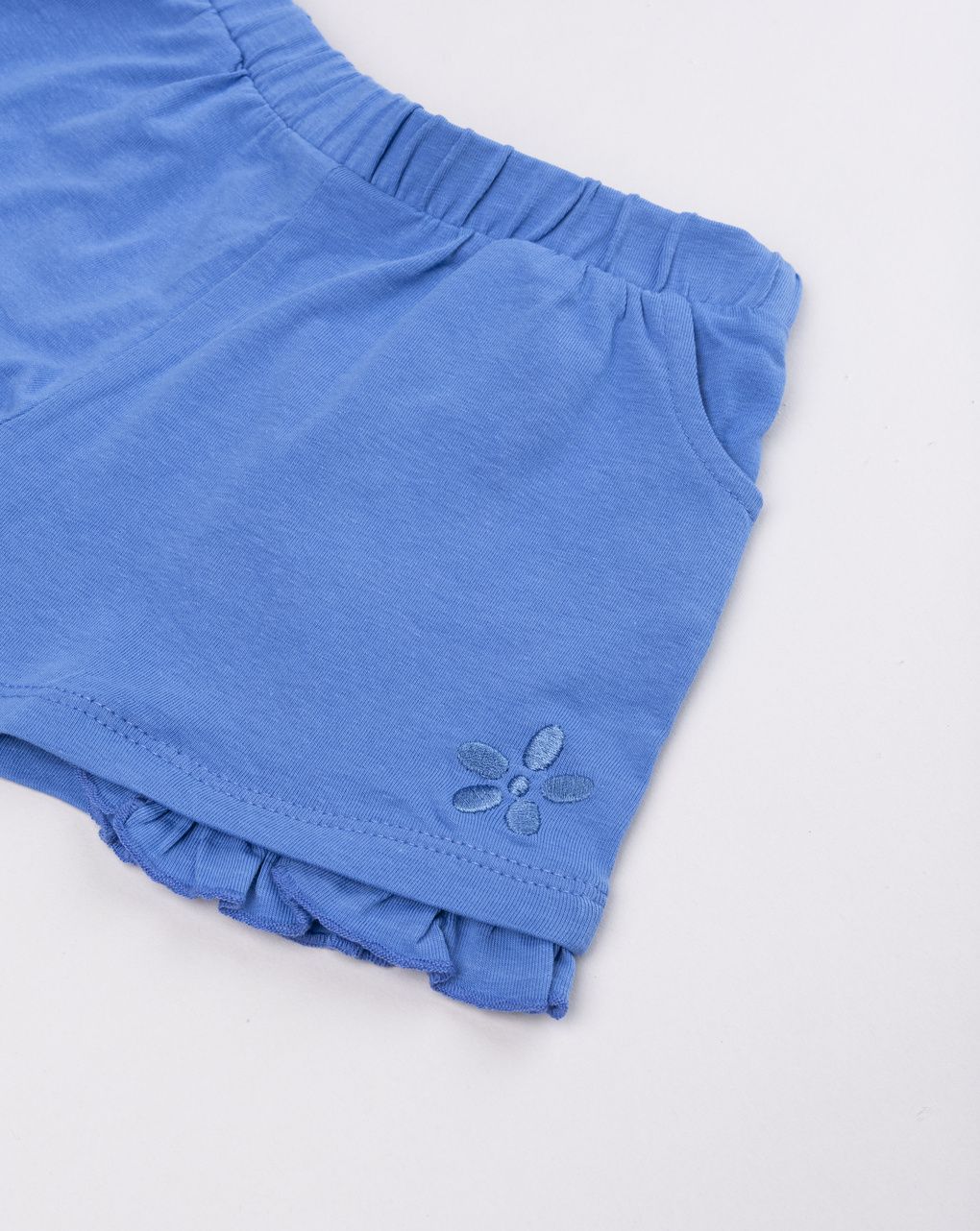 Shorts bimba blu con balza e ricamo