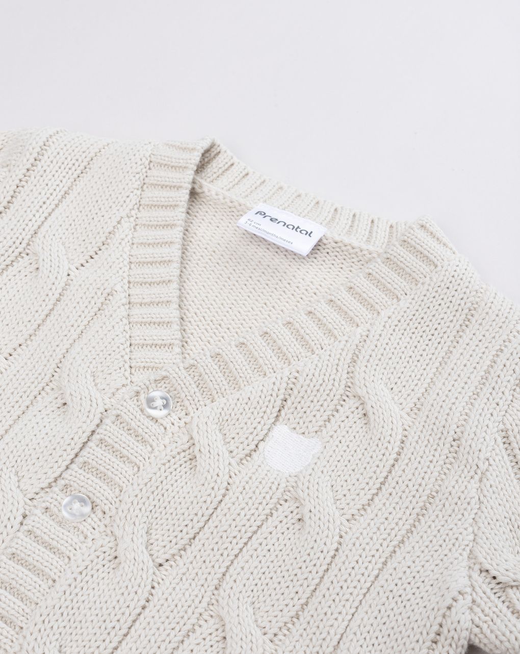 Cardigan tricot bimbo beige lavorazione a trecce