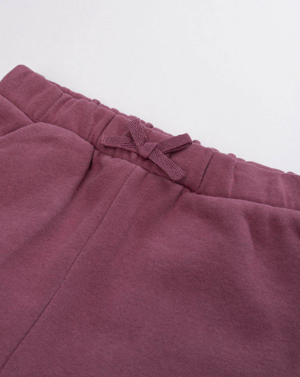 Pantalone felpato bimba bordeaux con fiocco