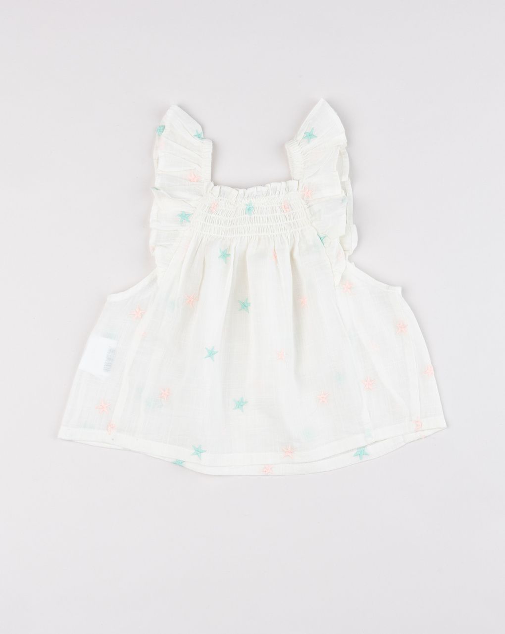 Blusa smanicata bimba in mussola con stelle ricamate
