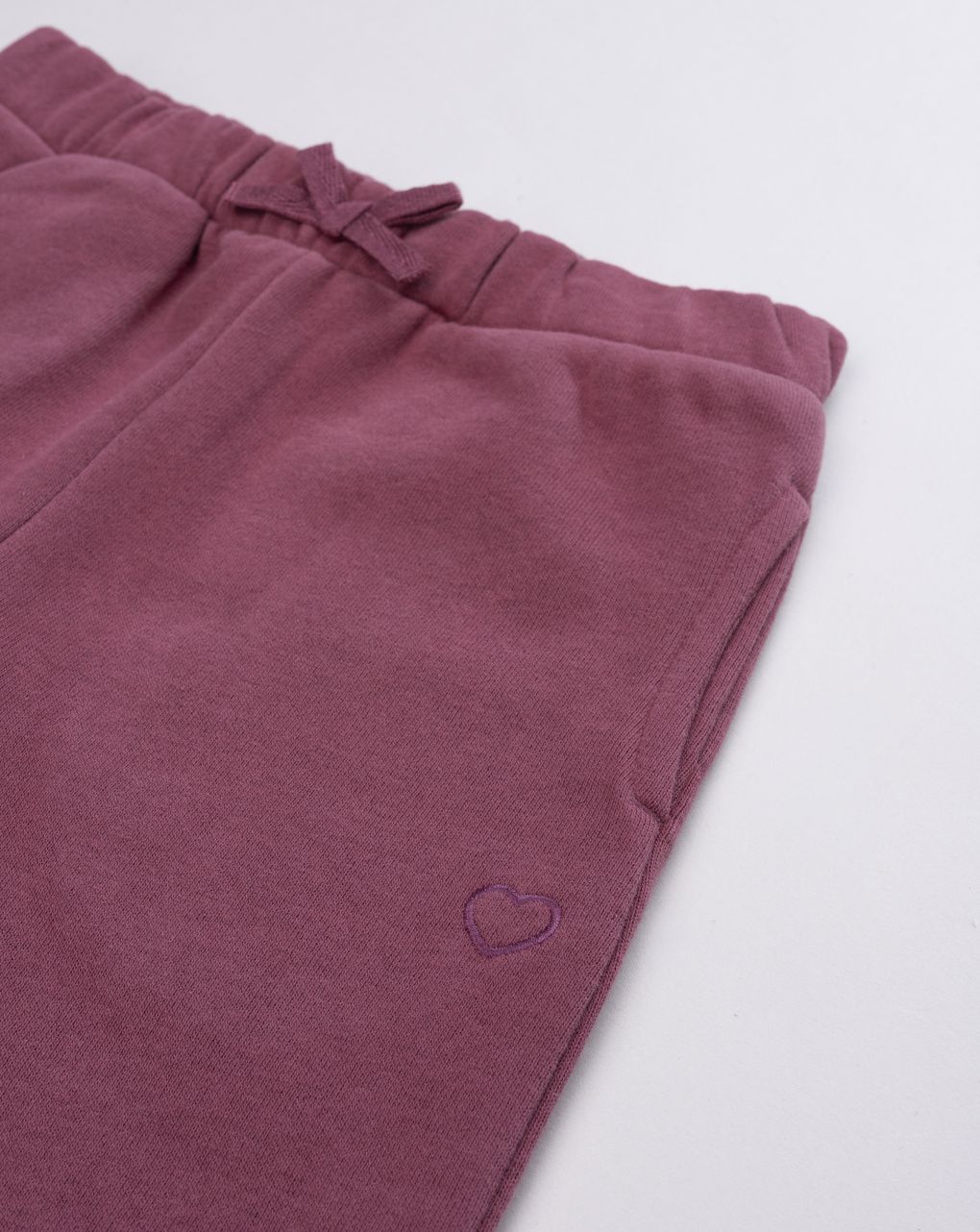 Pantalone felpato bimba bordeaux con fiocco