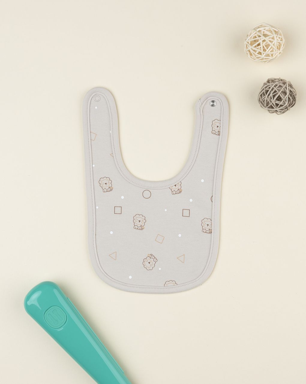 Bavaglino neonato beige leoni