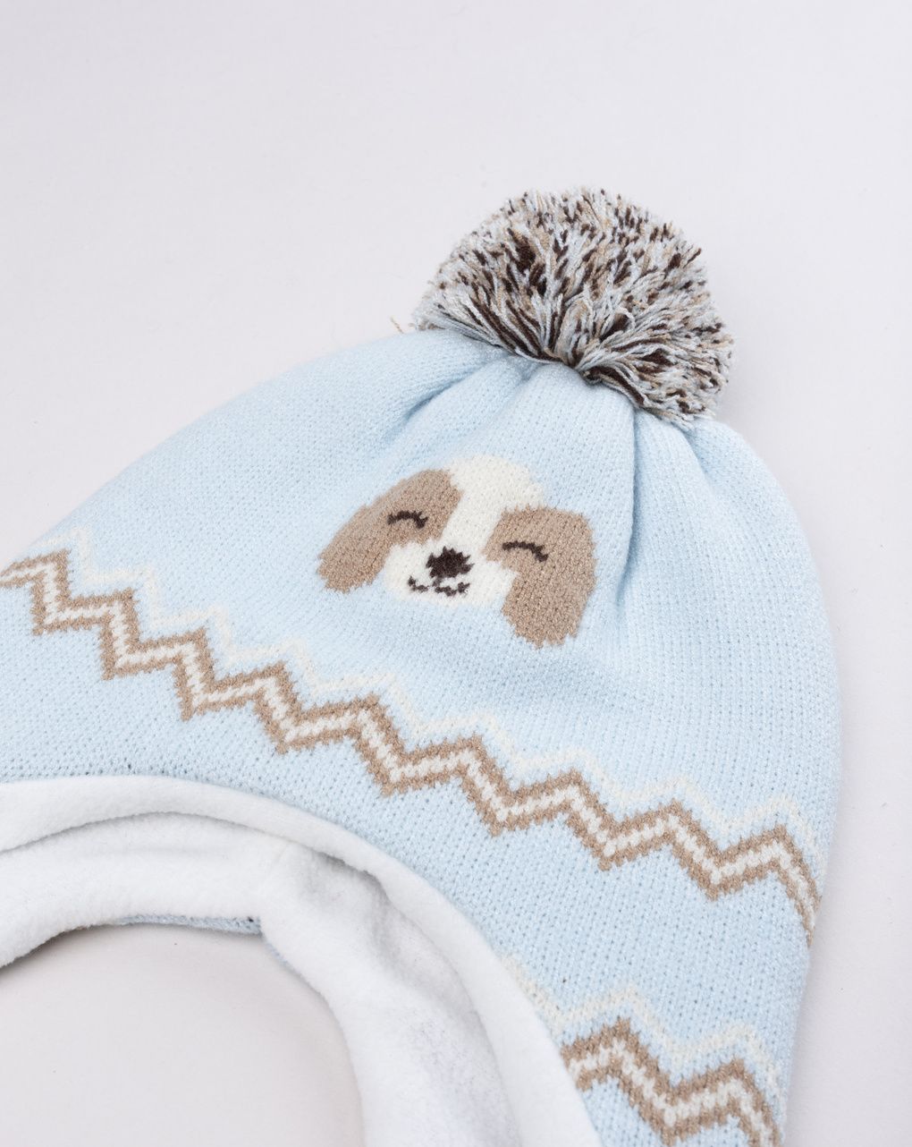 Peruviano bimbo azzurro cagnolino con pon pon