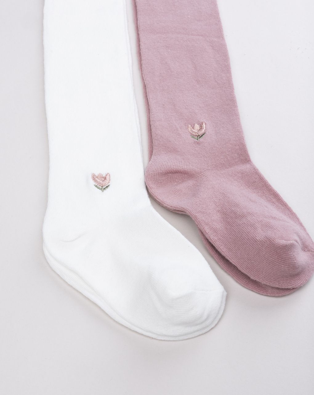 Pack 2 collant bambina bianco e rosa con ricamo fiore