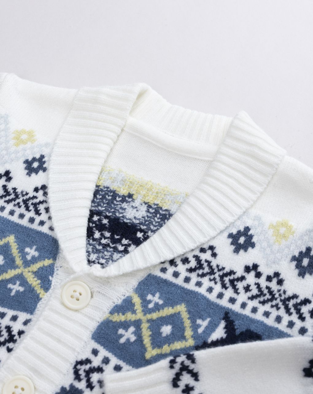 Cardigan bimbo bianco con collo a scialle e volpette