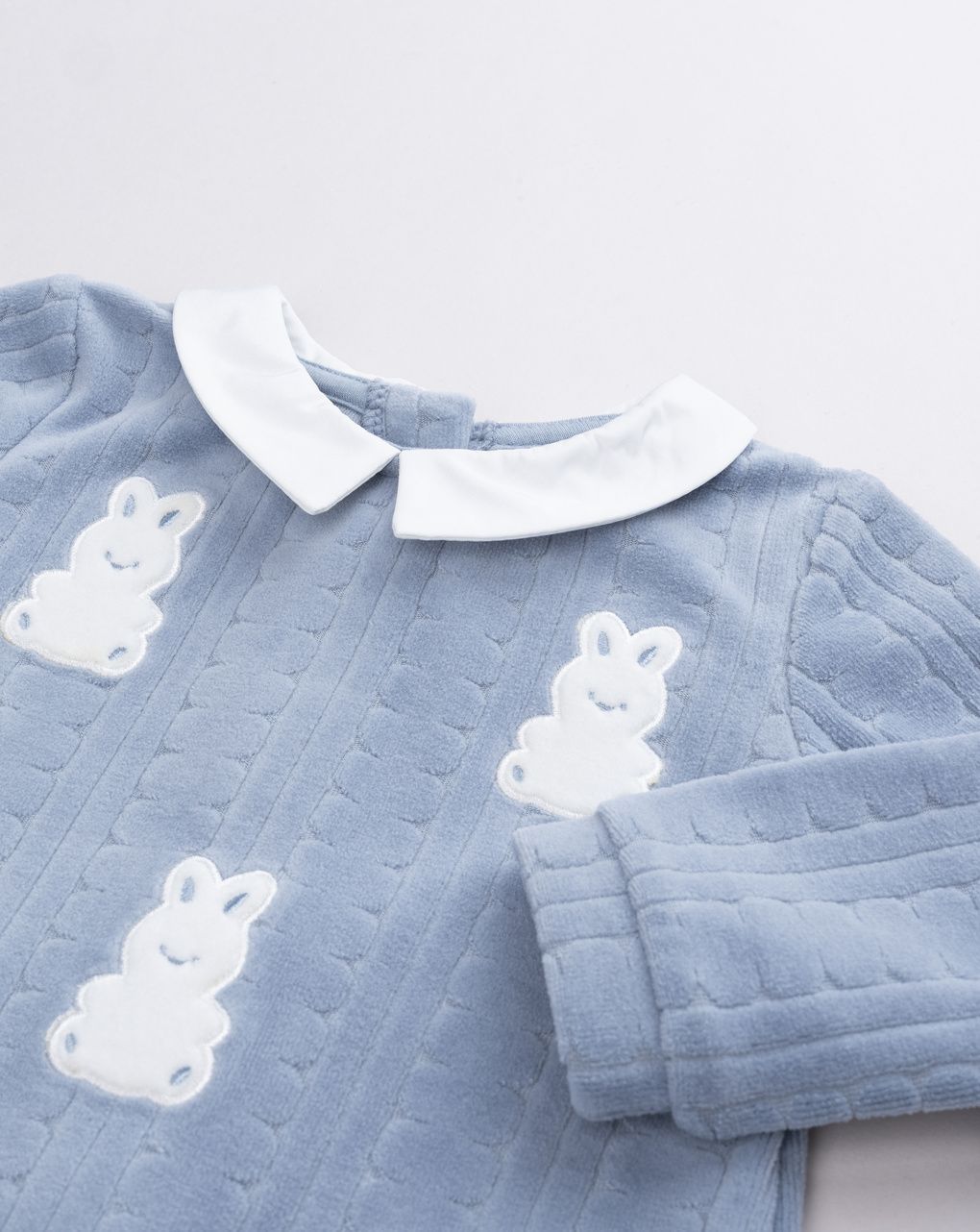 Tutina neonato ciniglia azzurra coniglietti